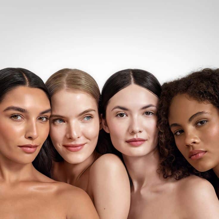 Four diverse women showcasing different skin tones before Pico laser whitening treatment at ID Cosmetic Clinic Toronto